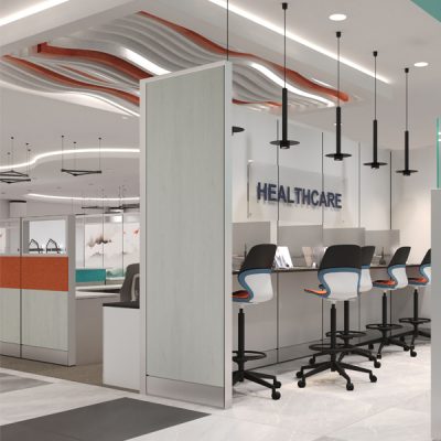 Interior of a Healthcare Facility Featuring Workstations and a Reception Area